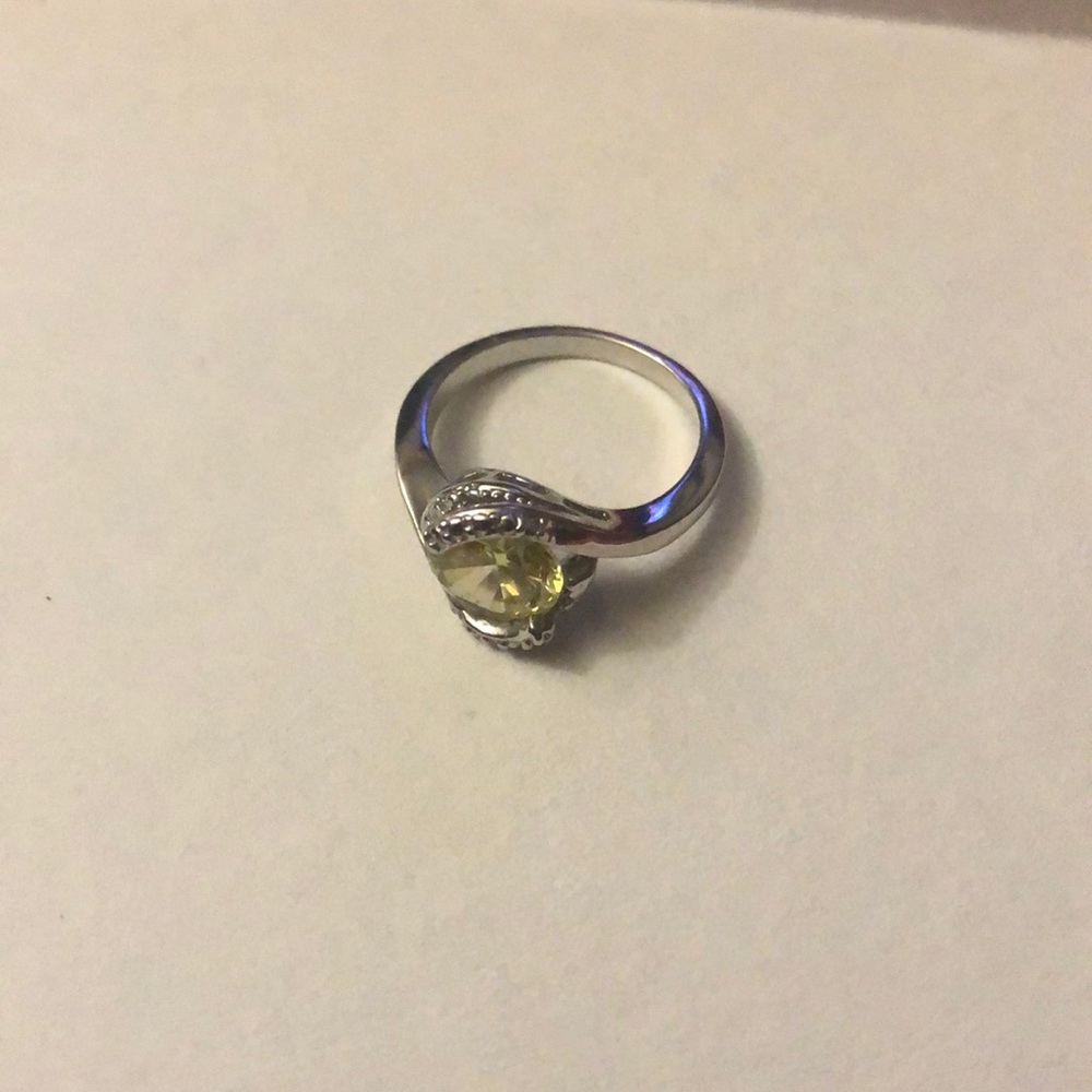 Costume ring with yellow stone